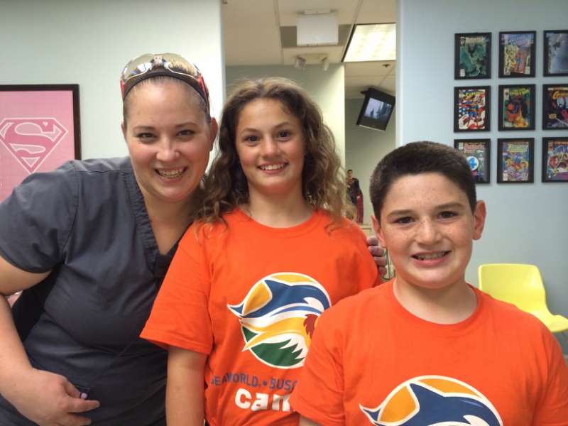 dr. ellen im staff with children