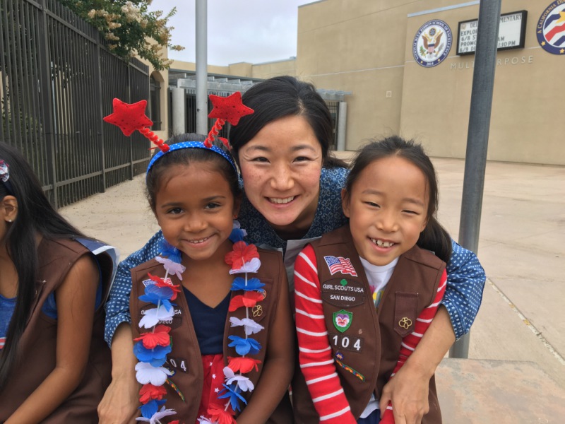 dr. ellen im smiling with two children