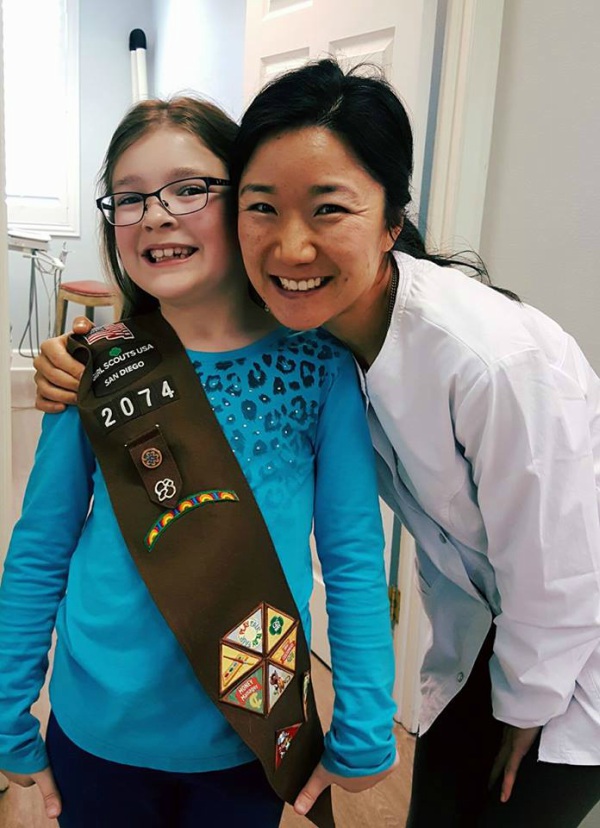 dr. ellen im pediatric dentistry with girl scout