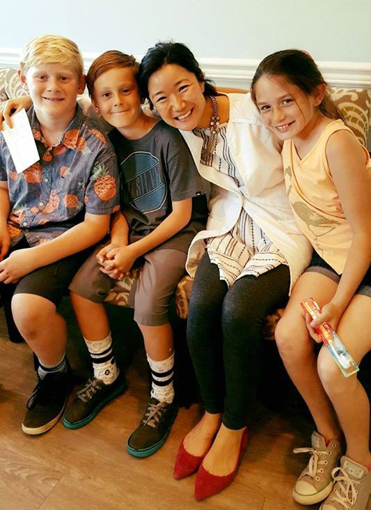 dr. ellen im pediatric dentistry staff with kids