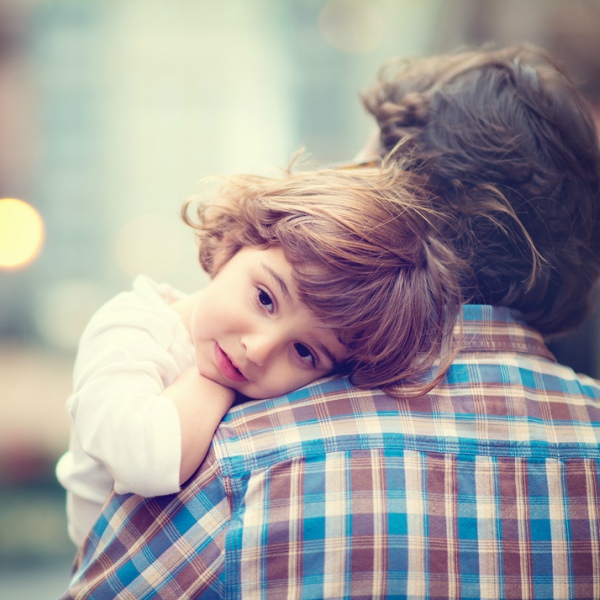 child hugging parent