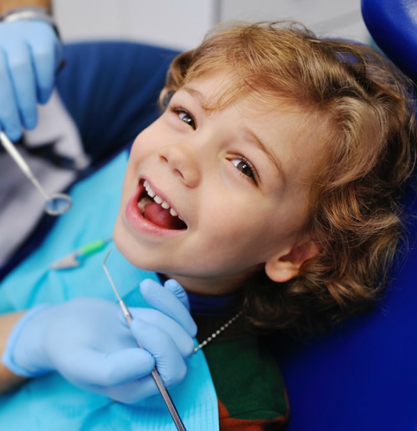 dr. ellen im pediatric dentistry young child in chair